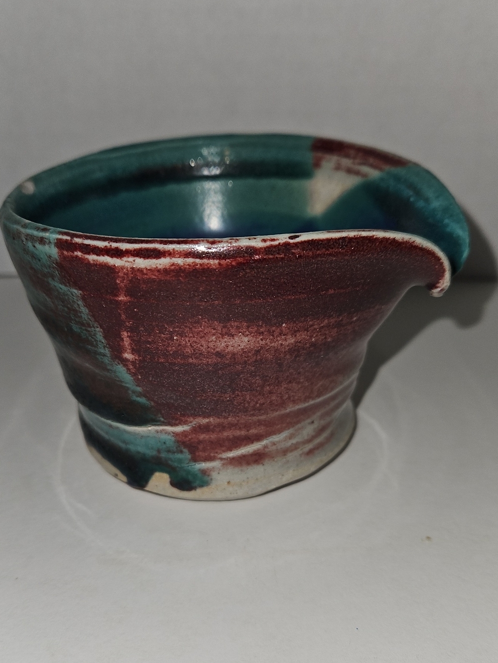 Hand Thrown Studio Pottery Pouring Bowl Glazed in Teal and Maroon
